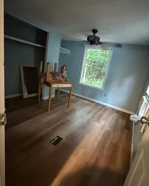 Empty room with a clean wood floor