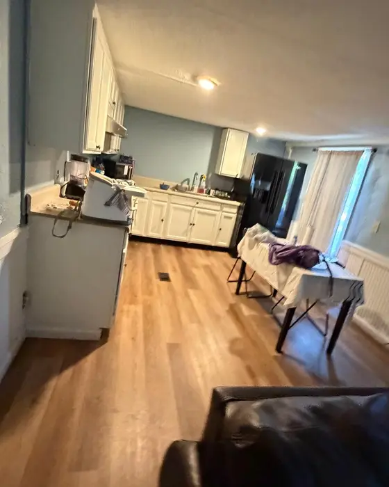 Before: kitchen with a cluttered table